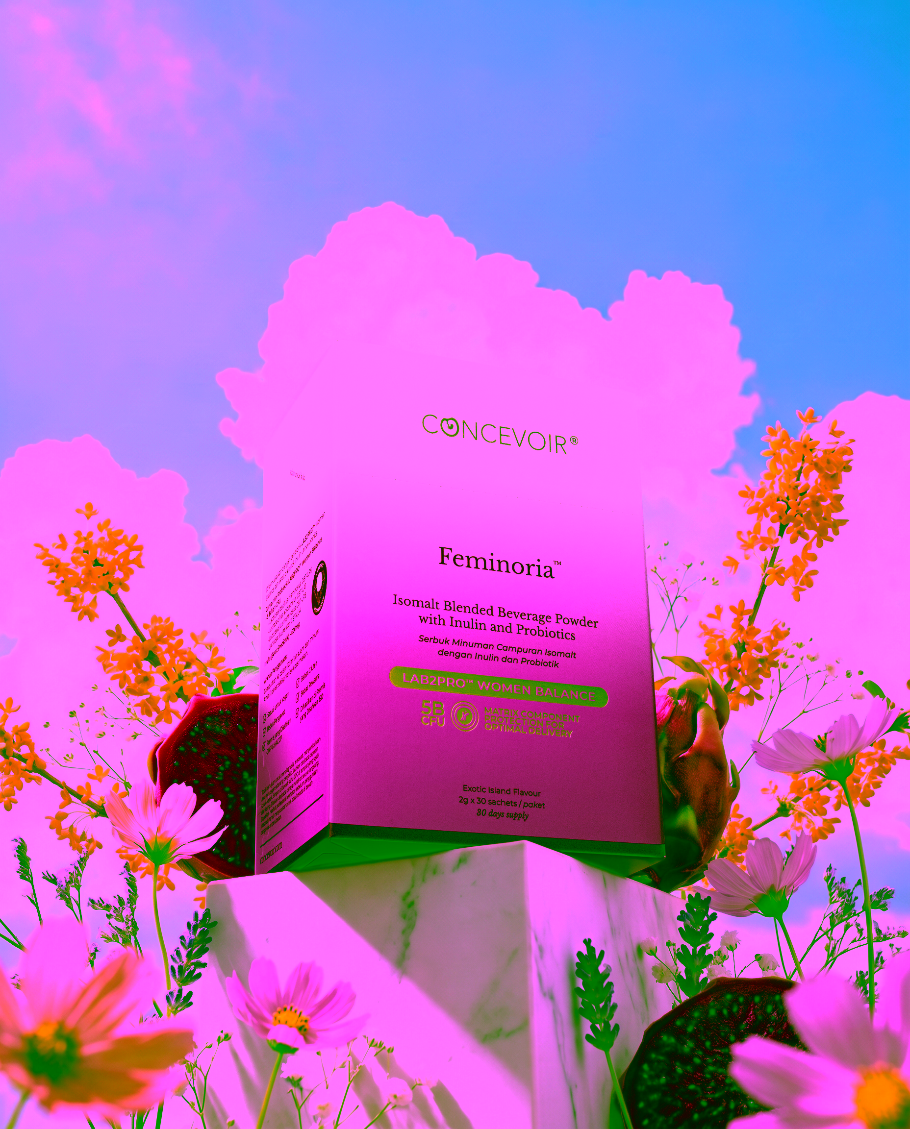 Feminoria Exotic Island box on a marble plinth among wildflowers under a blue sky