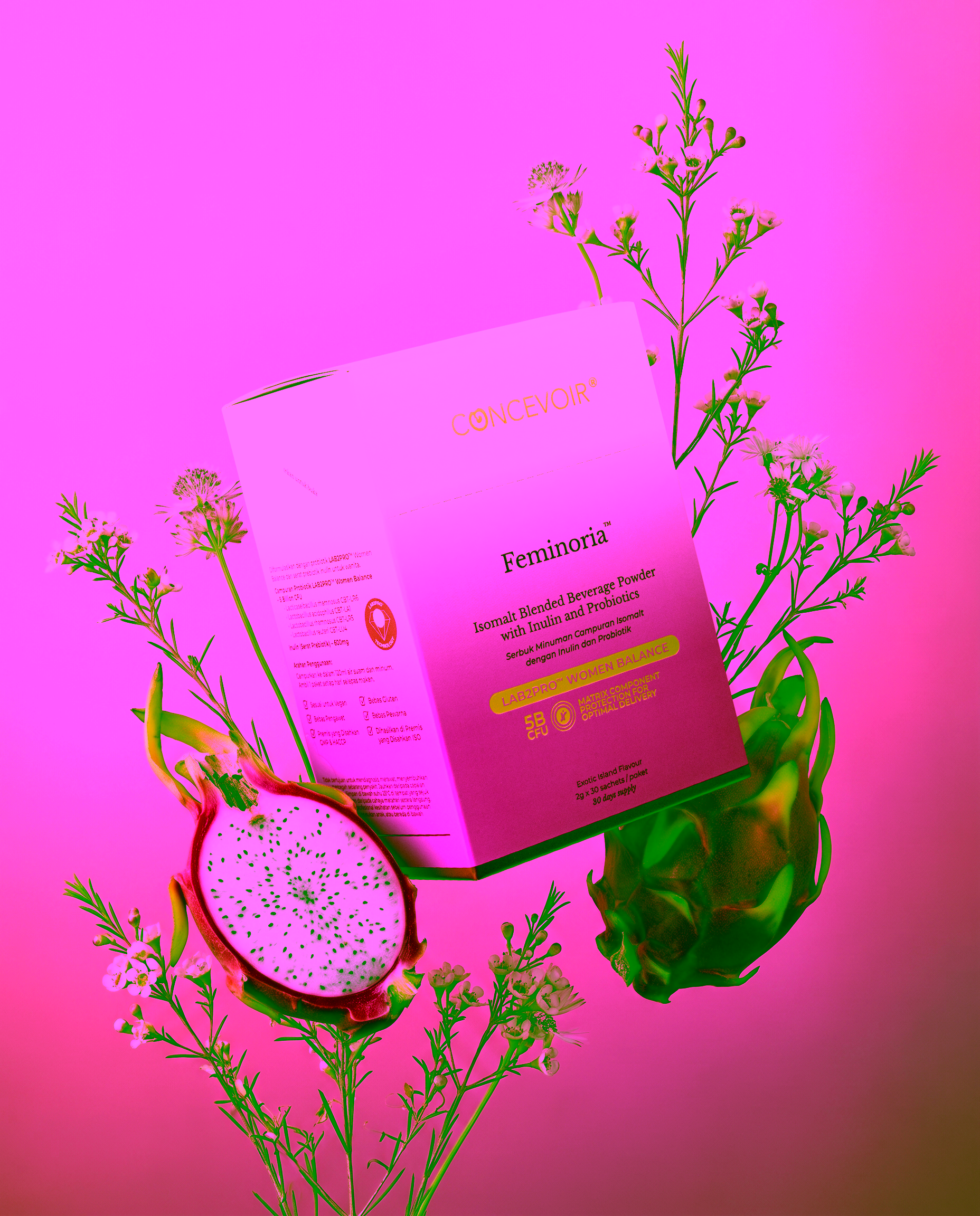 Feminoria Exotic Island box floating with dragonfruit on a soft pink backdrop